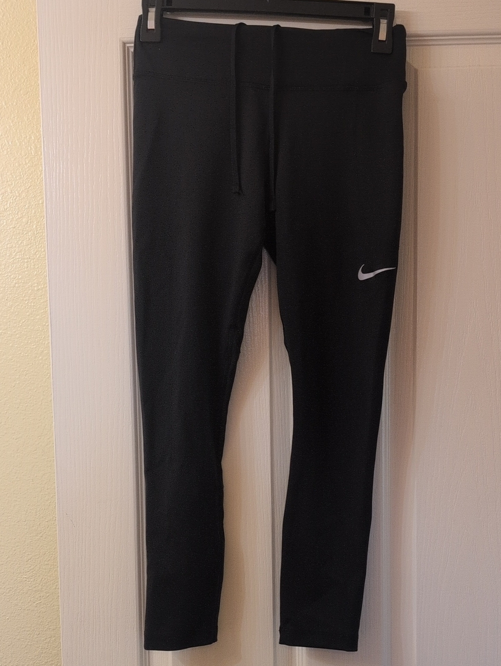 Nike Kids Black Athletic Leggings with White Swoosh
